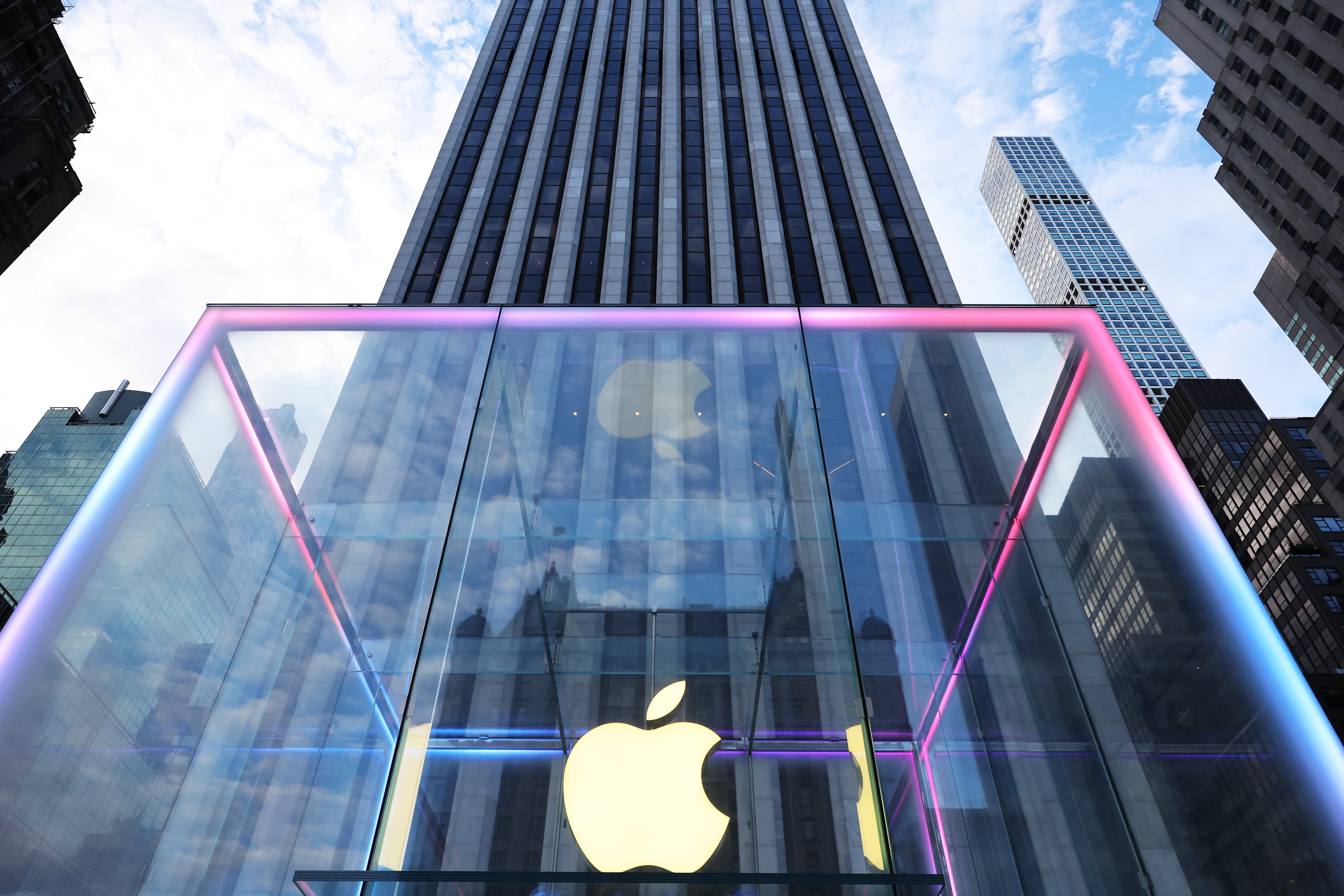 Apple logo on a glowing glass display