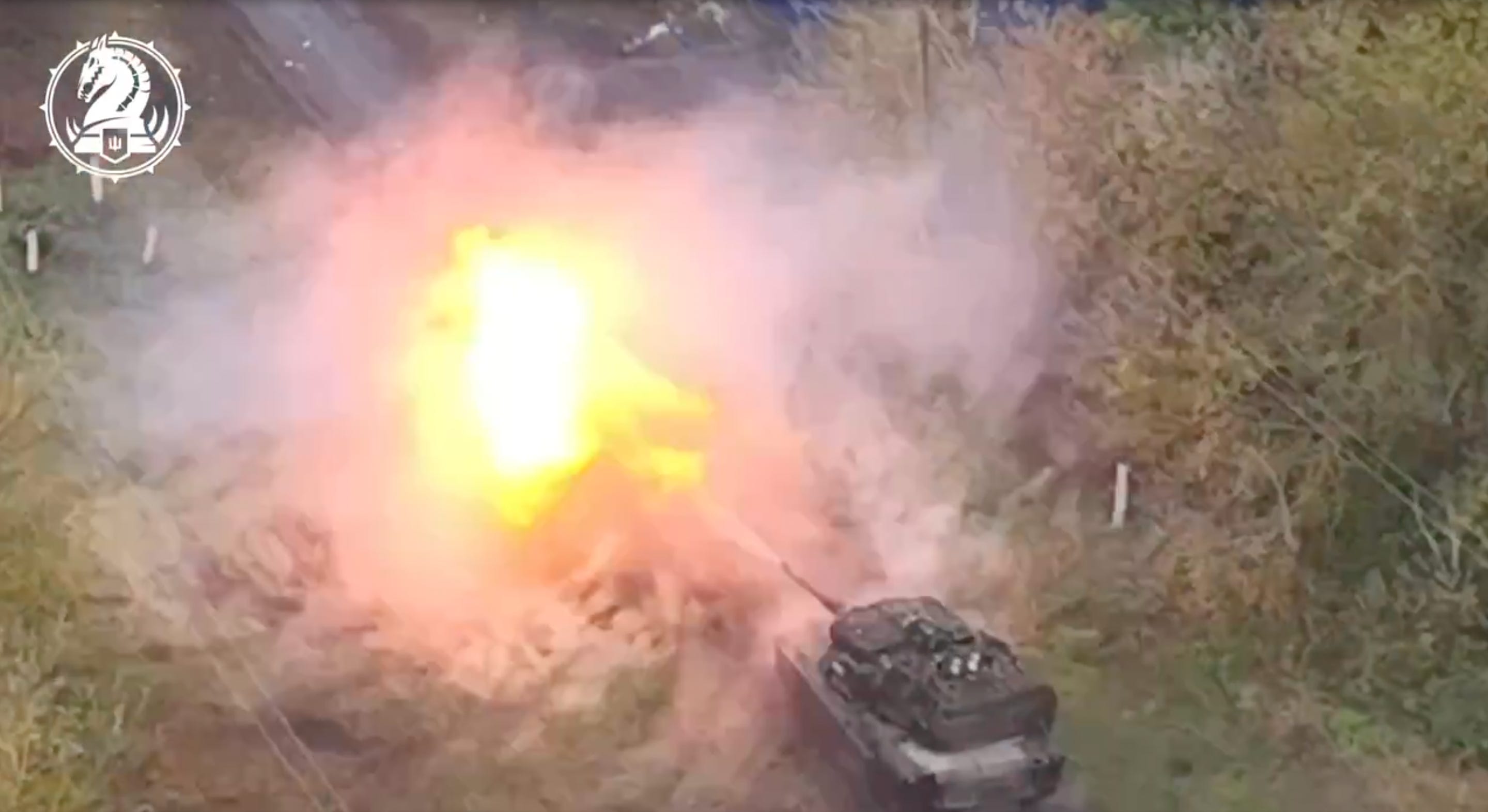 An M1 Abrams tank firing its cannon.