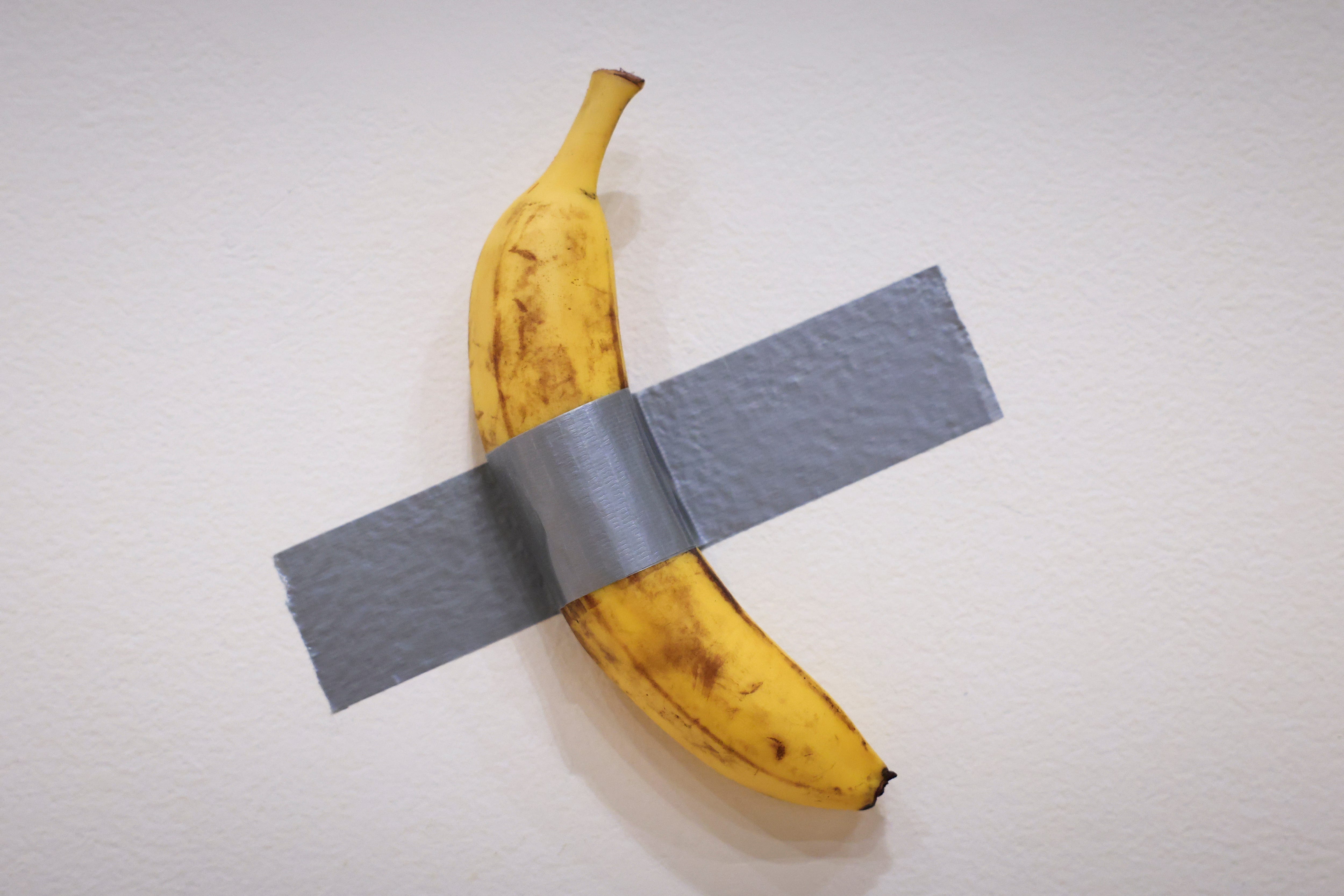 Italian visual artist Maurizio Cattelan's duct-taped banana art piece, "Comedian."